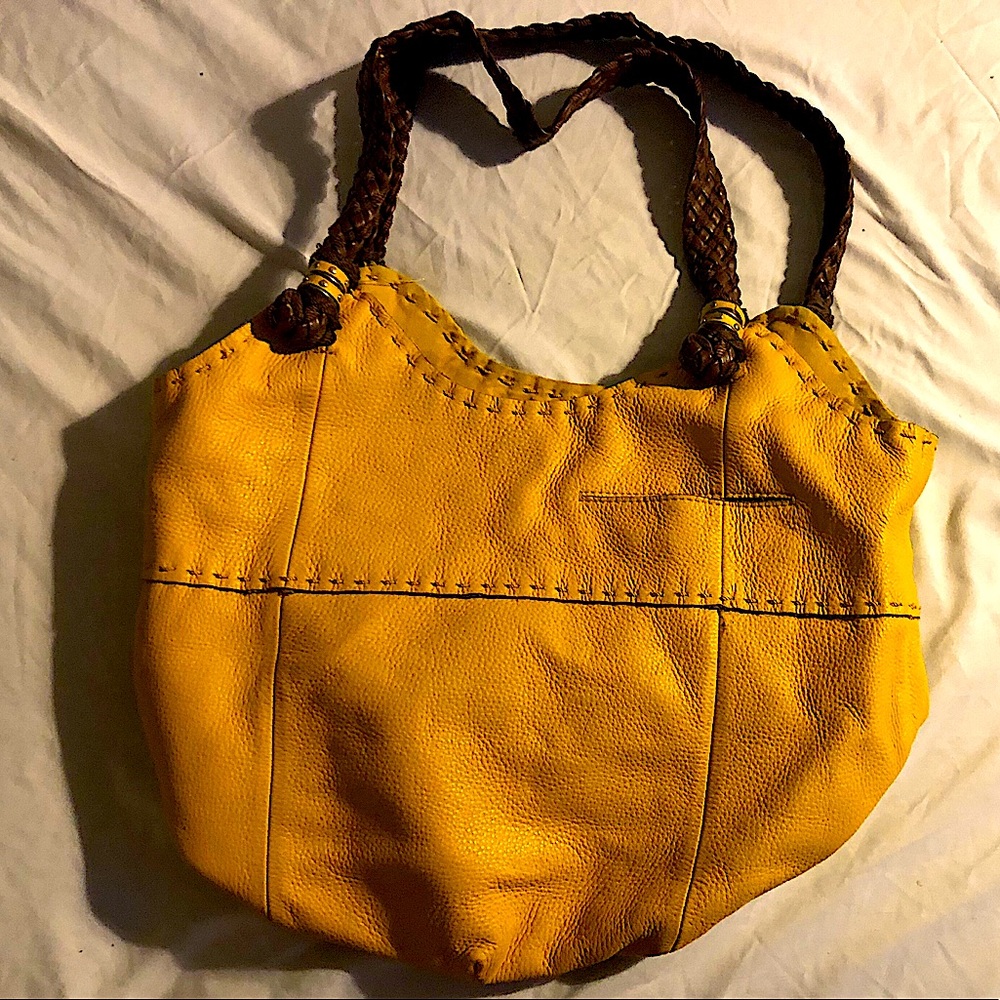The Sak yellow leather braided strap satchel
